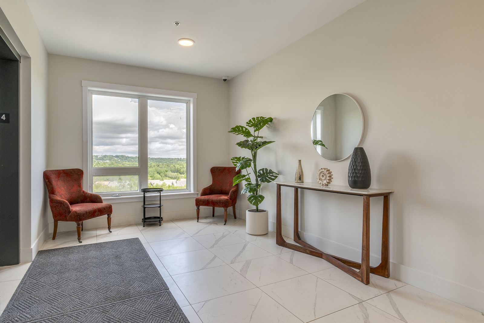 Quiet seating nook by a window on an upper floor